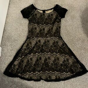 Girl size 12 formal dress
Black lace 
Gold underneath